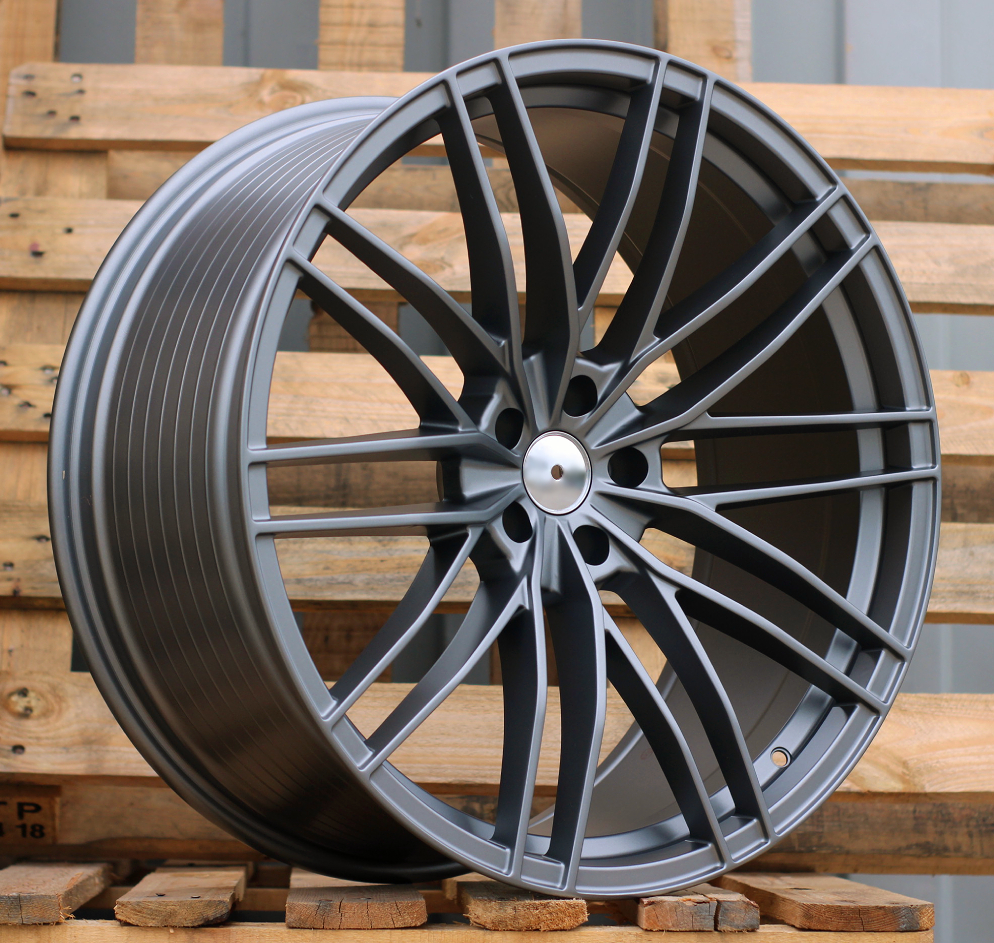 Audi F1995  Pelēks Gunmetal pusmatēts R23 5X112 10J et15 66.5