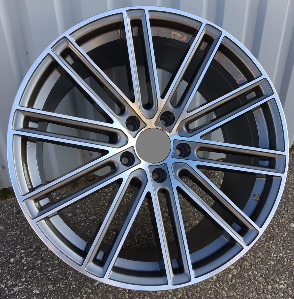 Porsche B1271  Pelēks ar pulētu virsmu un pulverlaku R21 5X130 9.5J et60 71.6